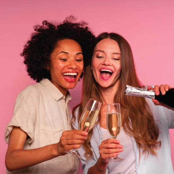 Two woman celebrating