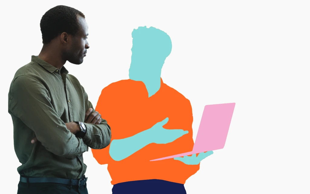 Two People discussing with a laptop