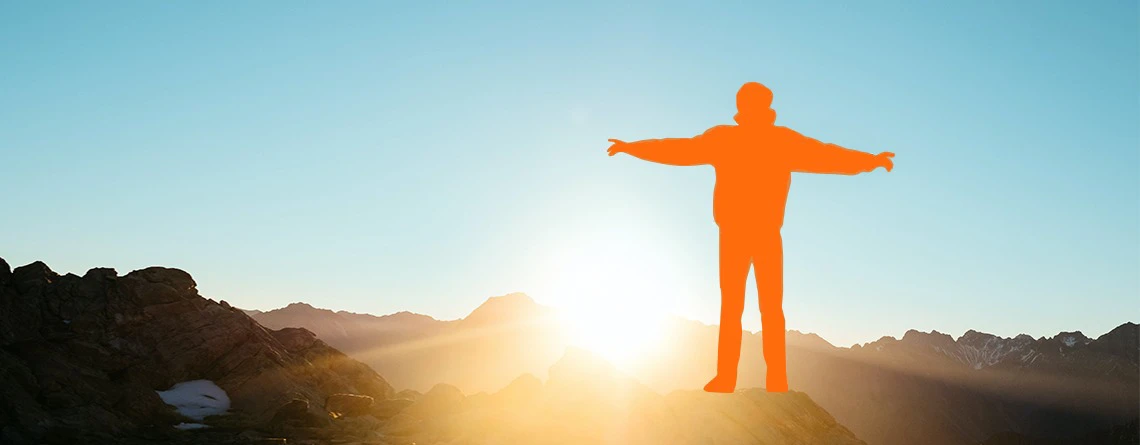 Person standing in mountains