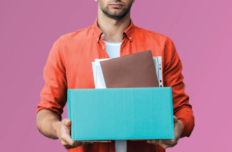 Man carrying a box with items