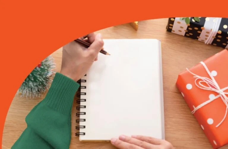 Person writing on a sketchpad