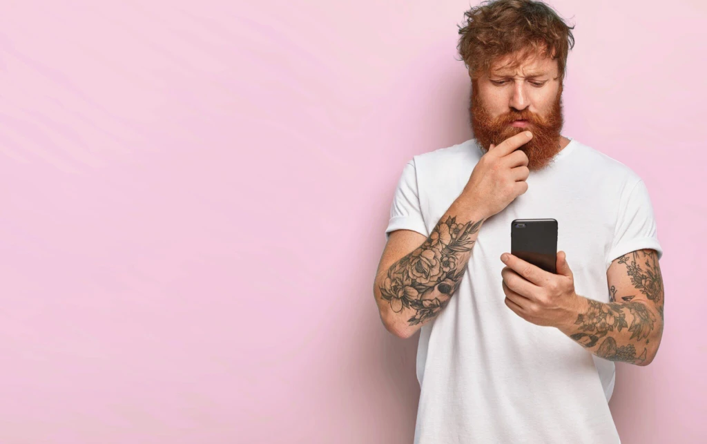 Person thinking while using phone