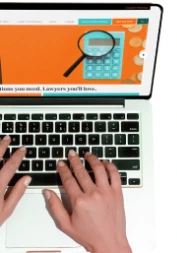 Image of a person sending an email