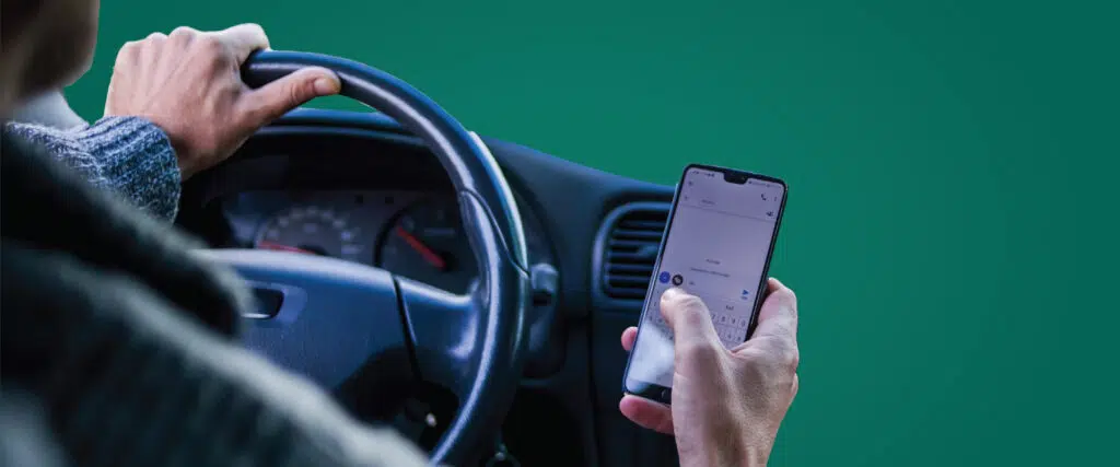Person texting while driving.