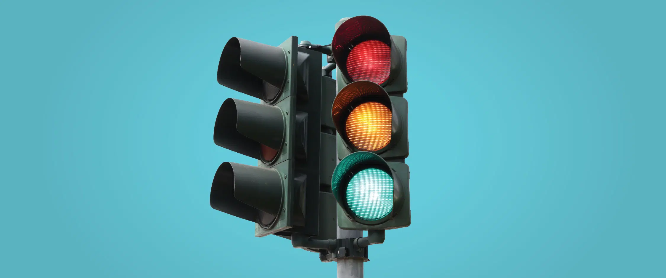 Stoplight on blue background